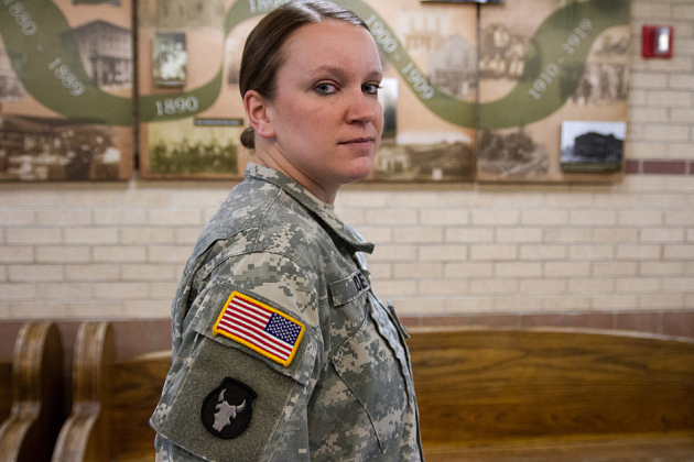 Minnesota Army National Guard Staff Sgt. Jennifer Noel at a press conference at the Rosemount National Guard Armory on Monday, Nov. 17, 2014 in Rosemount, Minn. This will be Sgt. Noel's second deployment. She went to Iraq for her first deployment in 2009. (Yi-Chin Lee / MPR News)
