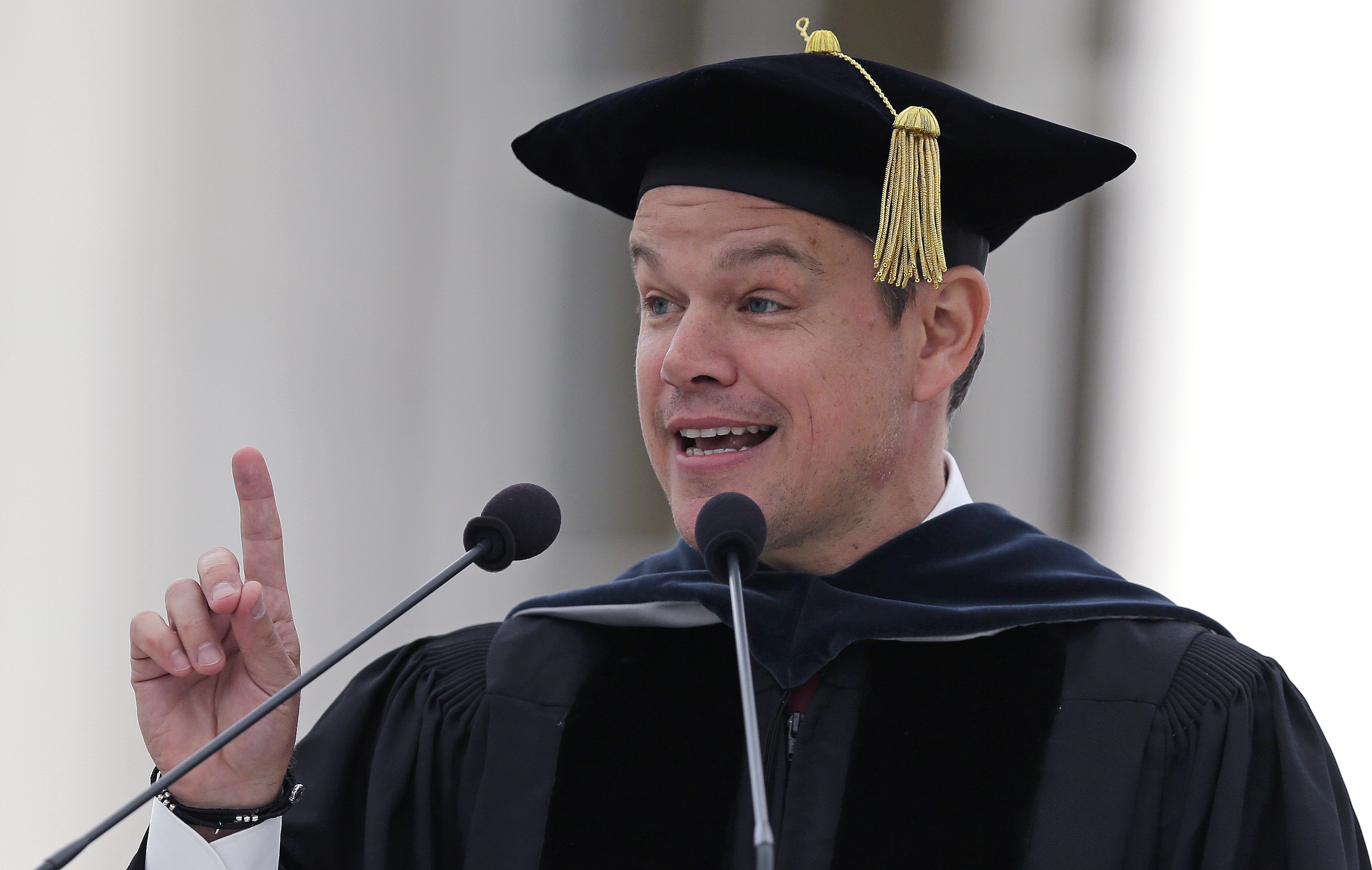 Actor Matt Damon gestures during his address at the Massachusetts Institute of Technology's commencement in Cambridge, Mass., Friday, June 3, 2016. Damon won an Academy Award for co-writing the 1997 film "Good Will Hunting", where he portrayed a mathematically gifted MIT janitor. (AP Photo/Charles Krupa)