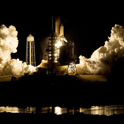 Space shuttle lifts off