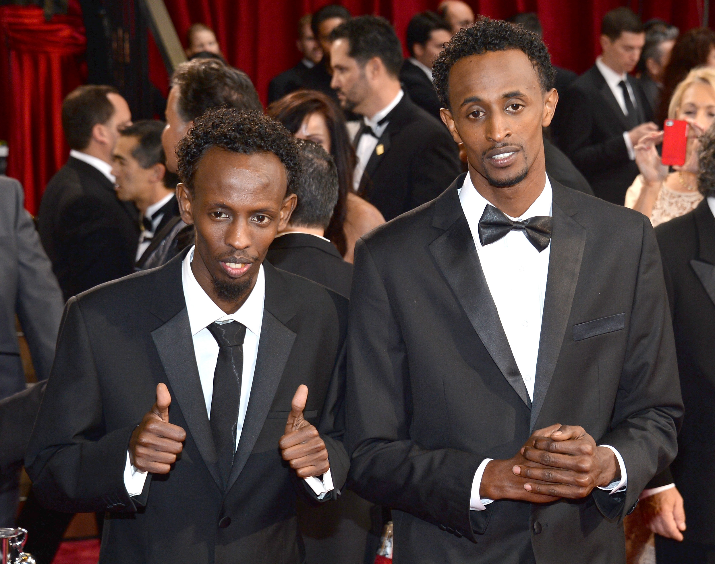 Actors Barkhad Abdi (L) and Faysal Ahmed attend the Oscars. Photo: Michael Buckner/Getty Images