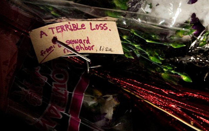 Flowers were left at the front door of Seward Market and Halal Meat on E. Franklin Avenue in Minneapolis Thursday, Jan. 7, 2010. MPR Photo/Jeffrey Thompson