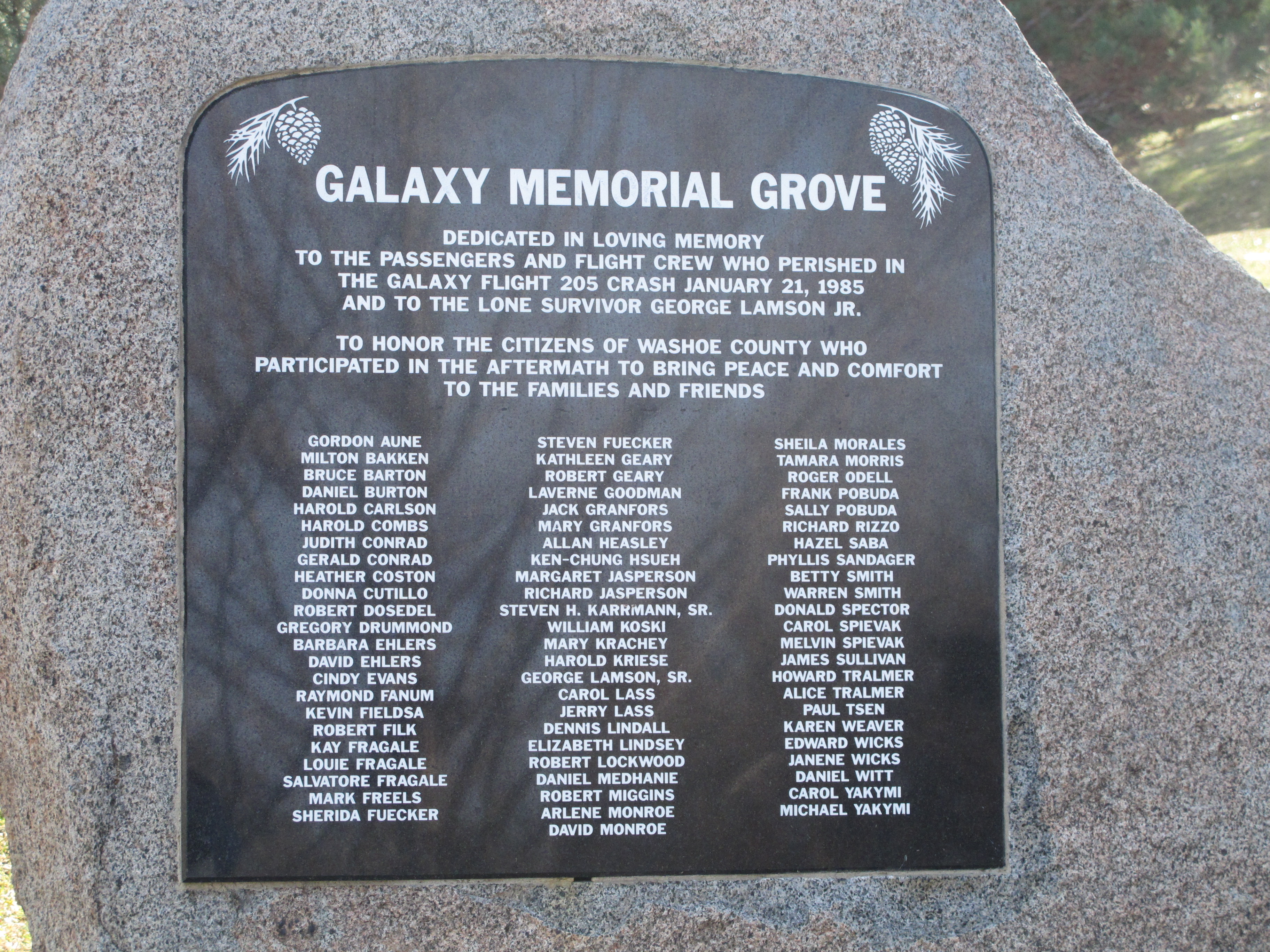 Washoe County officials have erected a new plaque in the memory of the 70 victims and lone survivor of the 1985 Galaxy Airlines Flight 203 crash in Reno, Nev., on Tuesday, Jan. 20, 2015, the day before a rededication ceremony on the 30th anniversary of the tragedy. An earlier plaque was stolen two years ago near the campus of the University of Nevada, Reno. (AP Photo/Scott Sonner)
