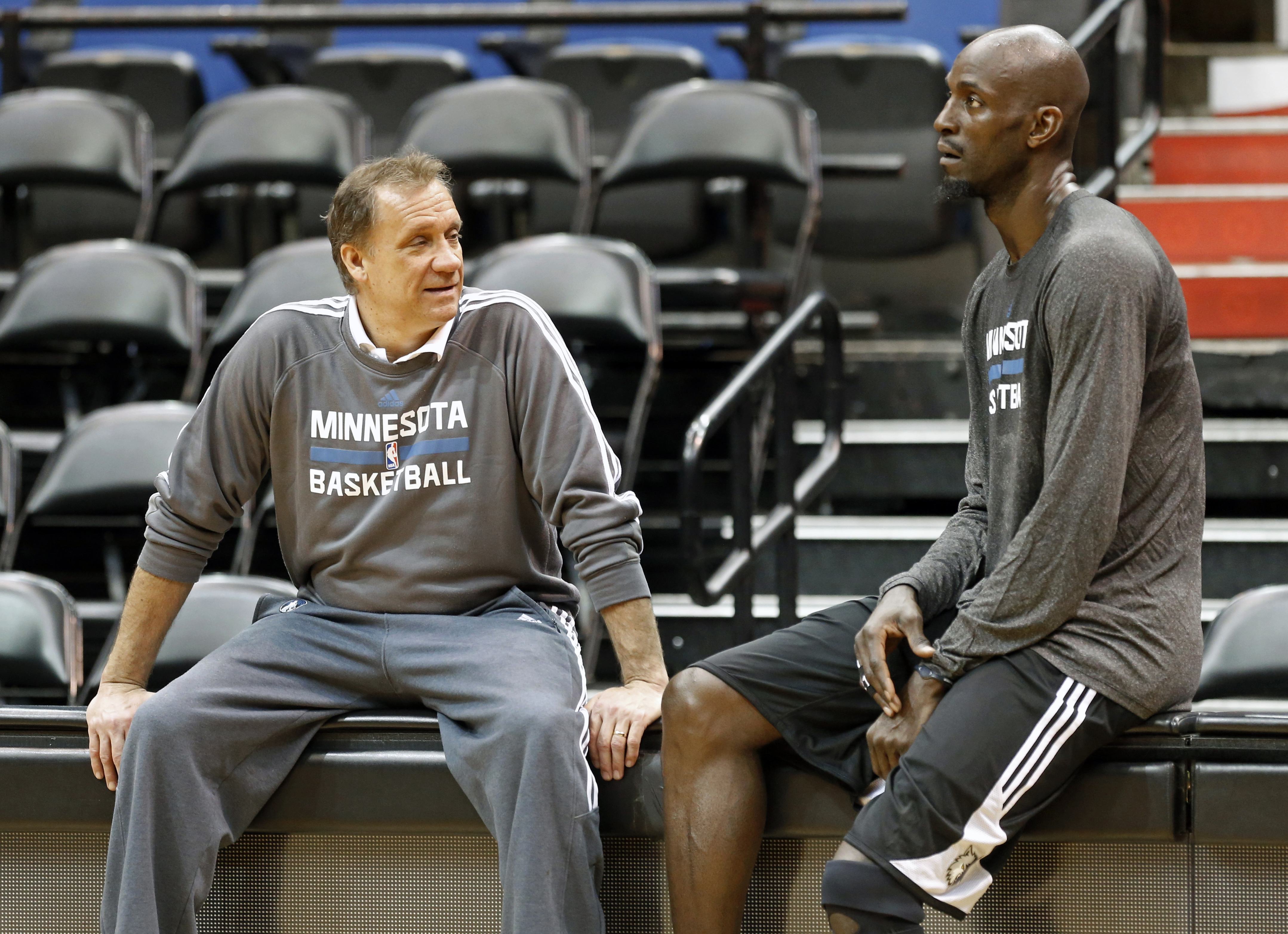 Minnesota Timberwolves star Kevin Garnett, right, talks with head coach Flip Saunders after his first practice upon his return to the former team that originally drafted him out of high school. Photo:  Jim Mone/Associated Press.