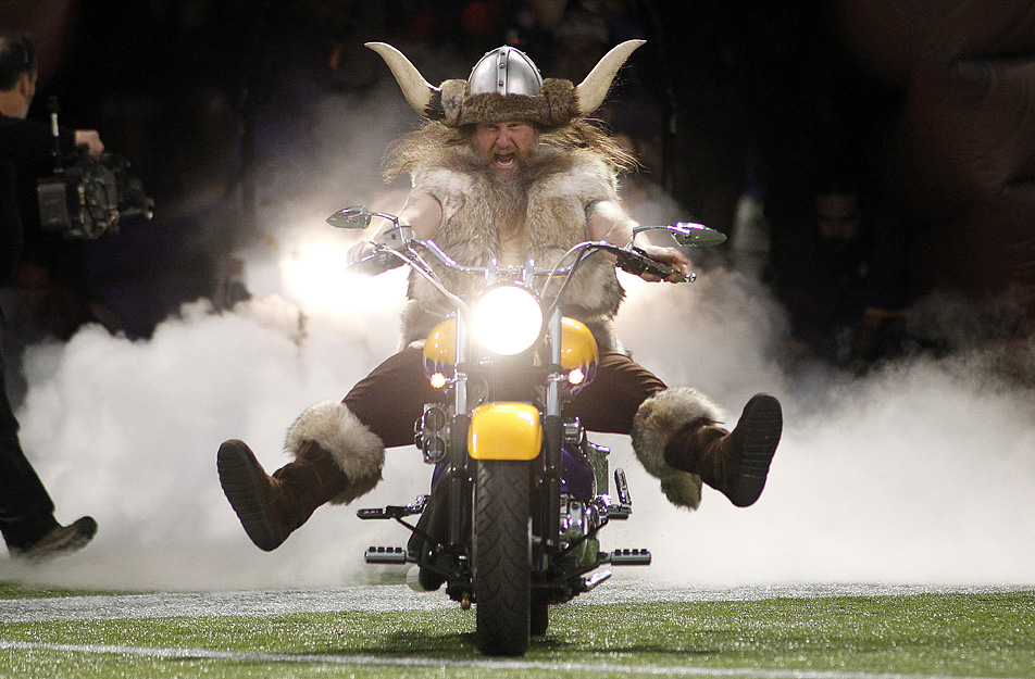 Minnesota Vikings mascot Ragnar drives on the field before an NFL football game between the Minnesota Vikings and the Chicago Bears Sunday, Dec. 9, 2012, in Minneapolis. (AP Photo/Andy King)