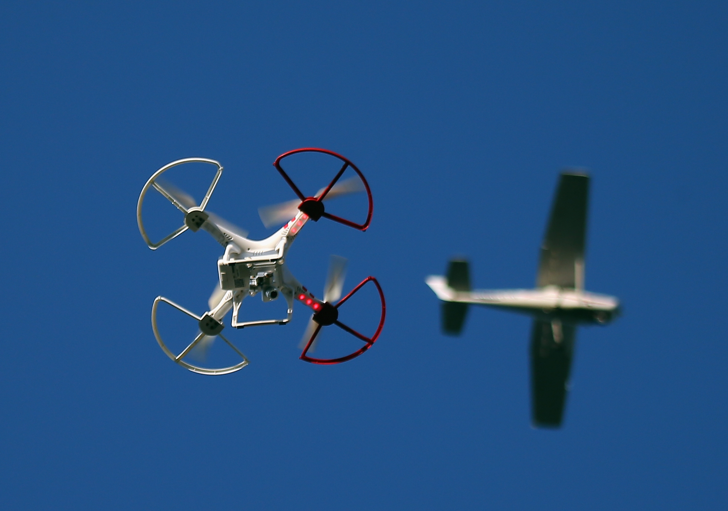 A drone is flown for recreational purposes in the sky above Old Bethpage, New York on September 5, 2015. Getty Images.
