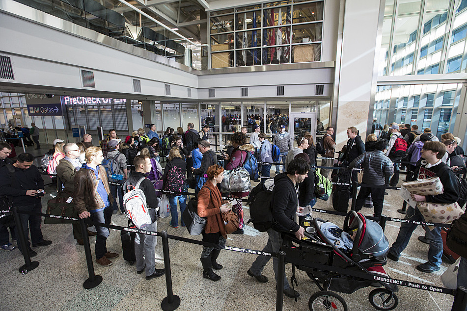 Long waits at security checkpoints have become the new normal at Minneapolis-St. Paul International Airport, where officials say the ranks of screeners has fallen while the number of travelers is rising. Leila Navidi | Star Tribune via AP