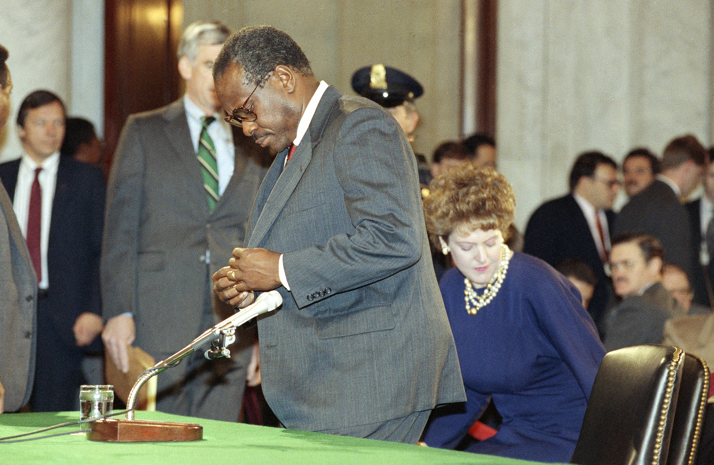 Judge Clarence Thomas prepares for another day of testimony before the Senate Judiciary Committee on Capitol Hill in Washington, Saturday, Oct. 12, 1991. (AP Photo/Greg Gibson)