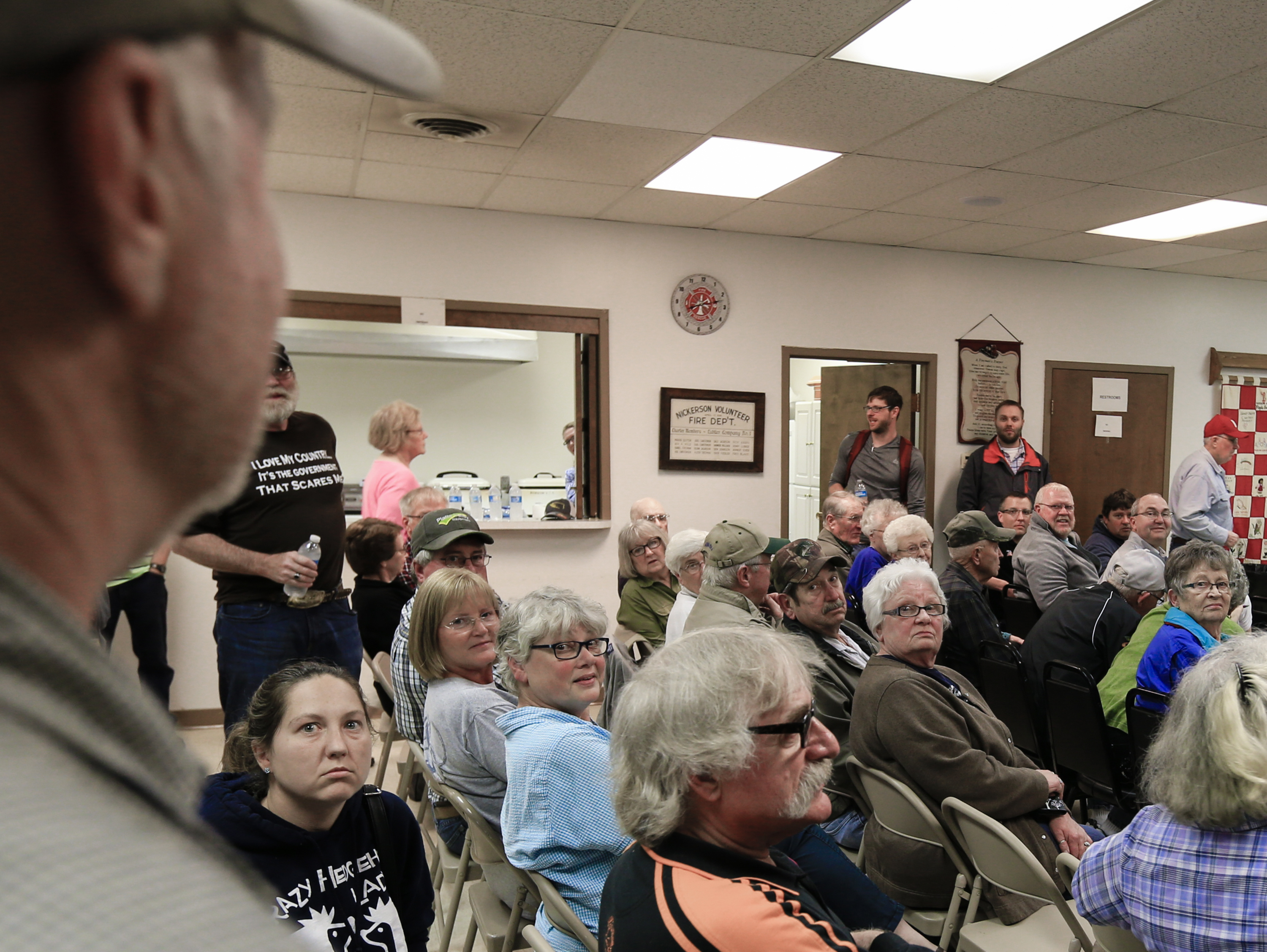 Residents of Nickerson, Neb., turn in their seats towards Randy Ruppert, left, during a meeting at the Nickerson, Neb., fire hall, Tuesday, April 19, 2016. When regional officials announced plans to open a $300 million chicken processing plant employing 1,100 workers, residents packed the firehall and the village board unanimously voted against the plant, and a week later the company gave up, saying theyd take their plant and jobs elsewhere. (AP Photo/Nati Harnik)