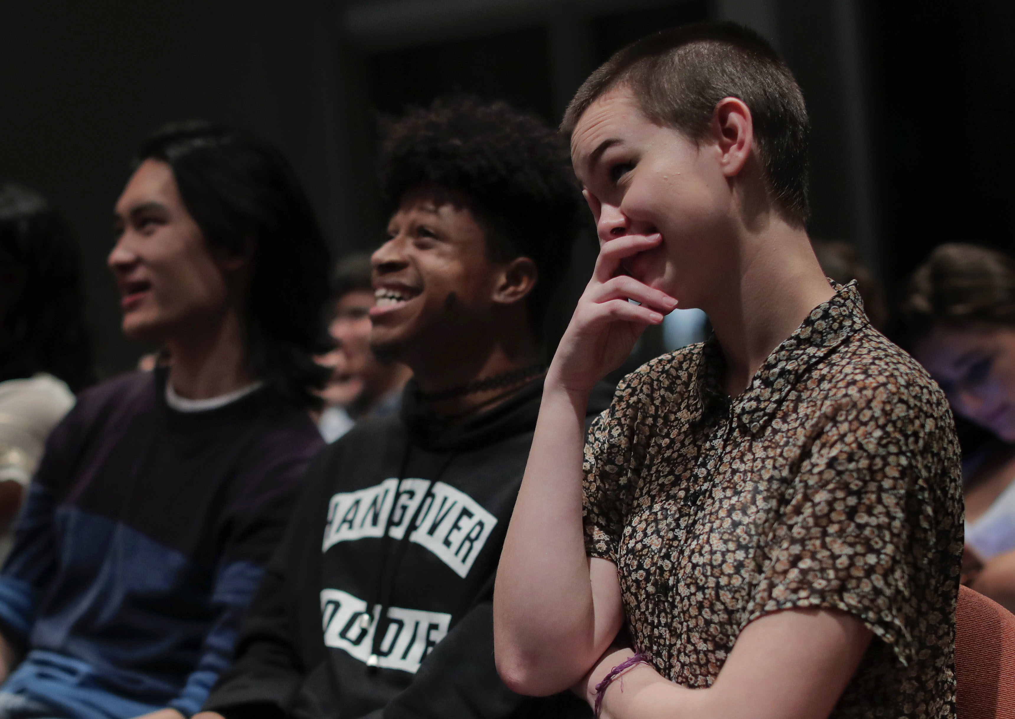 NYU students react while watching the presidential debate between Democratic candidate Hillary Clinton and Republican candidate Donald Trump during a debate watch gathering, Wednesday, Oct. 19, 2016, in New York. (AP Photo/Julie Jacobson)