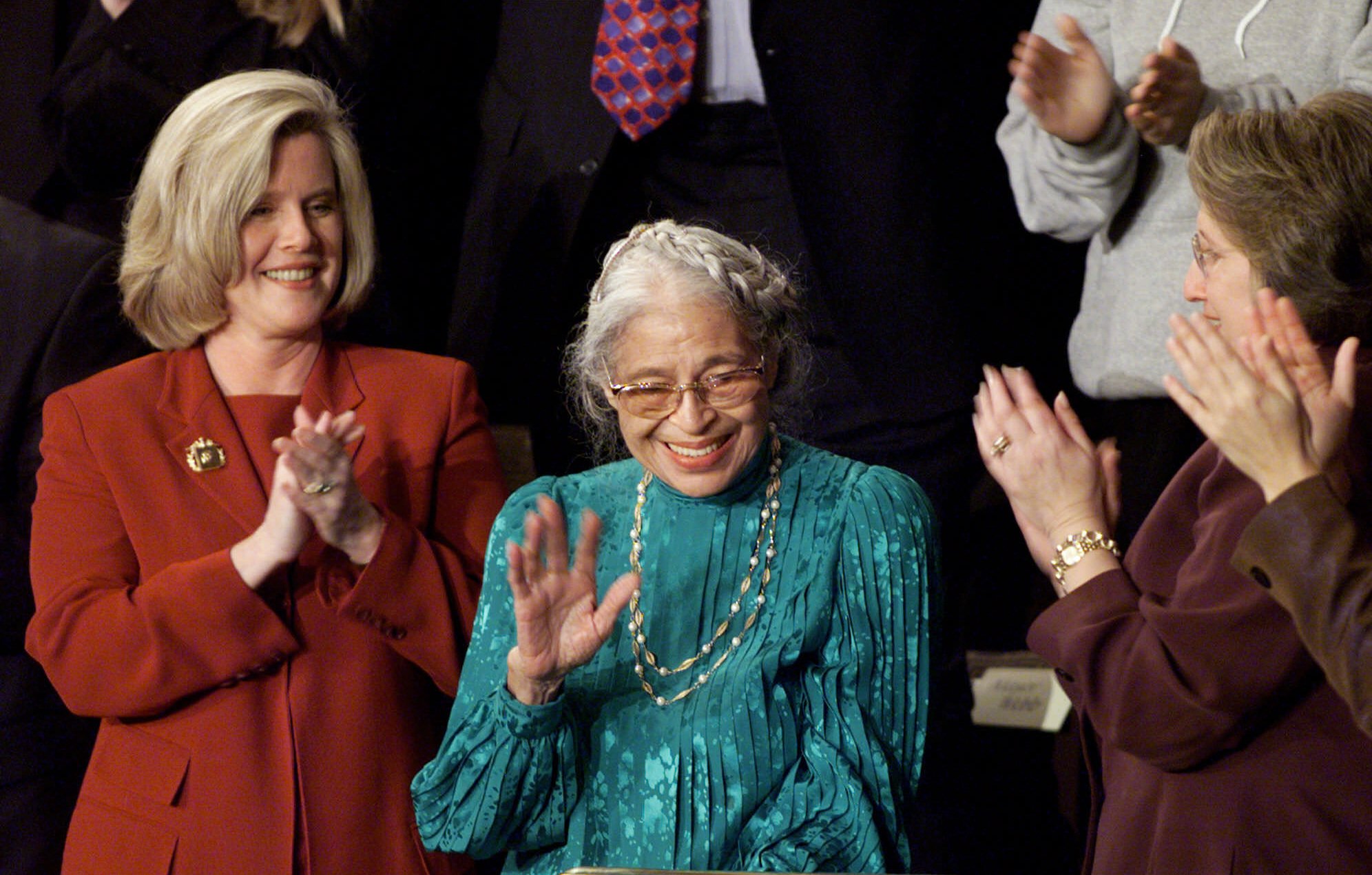 Rosa Parks acknowledges a standing ovation on Capitol Hill Tuesday, Jan. 19, 1999, after President Clinton spoke of her during his State of the Union address. Tipper Gore, wife of Vice President Al Gore is at left. (AP Photo/Ron Edmonds)