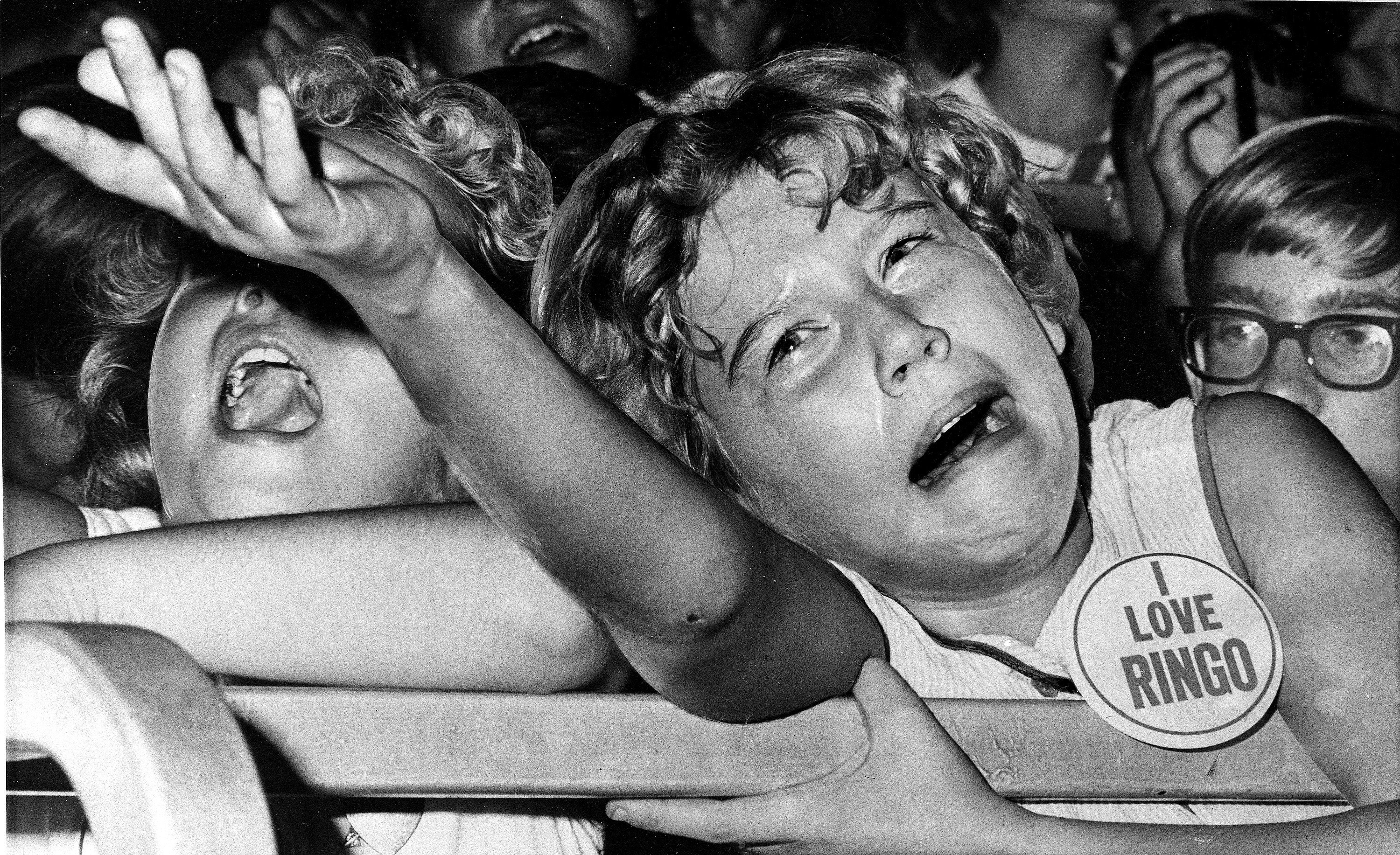 America's future as seen by a fan at a Beatles concert in Indiana on September 4, 1964. (AP Photo/Bob Daugherty)
