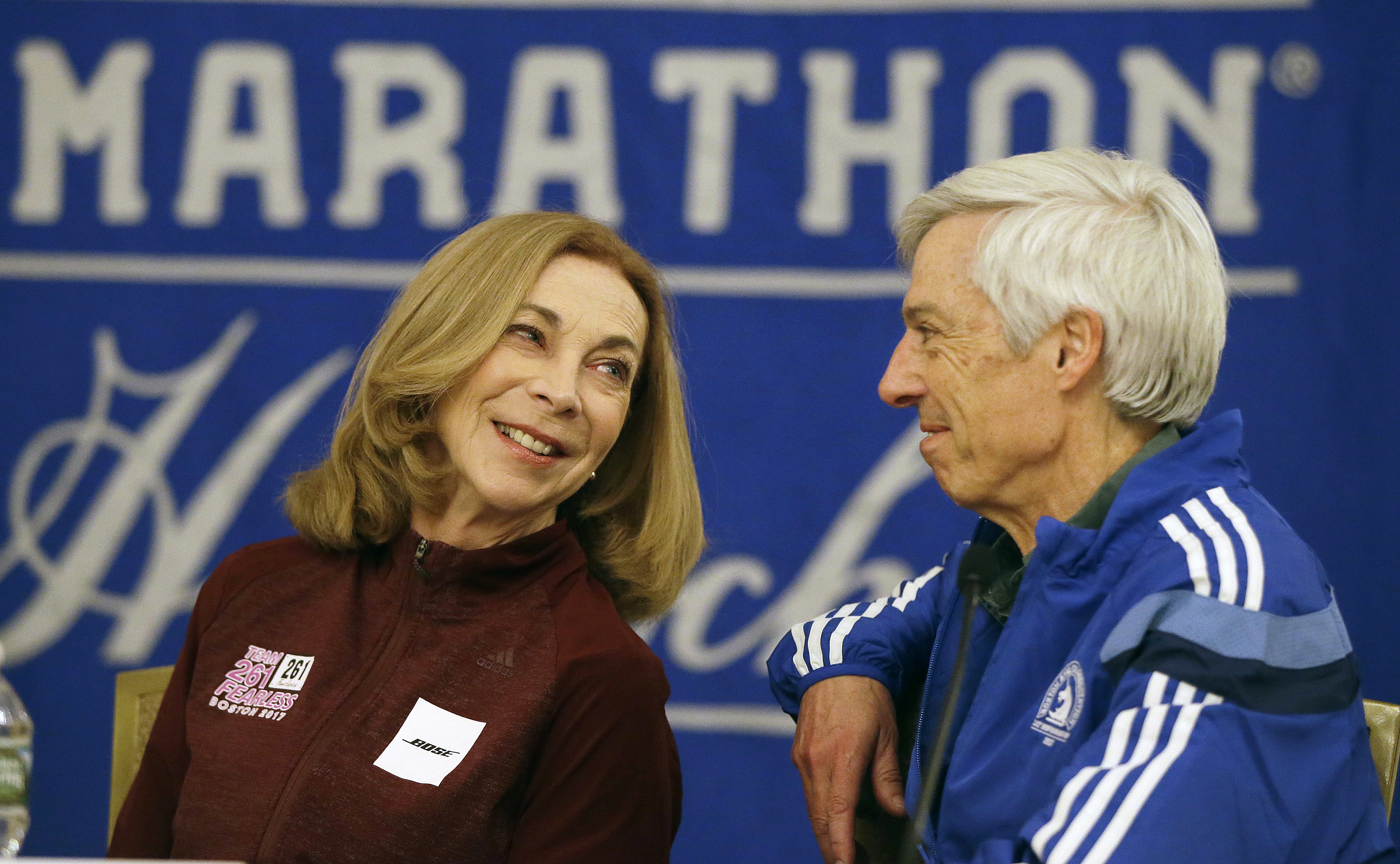 Kathrine Switzer talks with Ben Beach during a media availability at the Copley Plaza Hotel near the Boston Marathon finish line Thursday, April 13, 2017, in Boston. Beach is on the verge of becoming the first person to run the Boston Marathon 50 consecutive times if he completes the race on Monday. Switzer was the first woman with a bib issued by the Boston Athletic Association to finish the Boston Marathon in 1967. (AP Photo/Stephan Savoia)