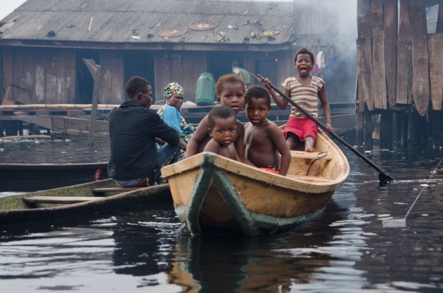 The sight of a white journalist drew strong reactions from children in Makoko. They screamed 'white man' in the local language. (MPR Photo/Nate Minor)